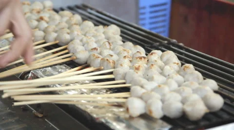 Porkballs sticks on grill Video stock 60113086