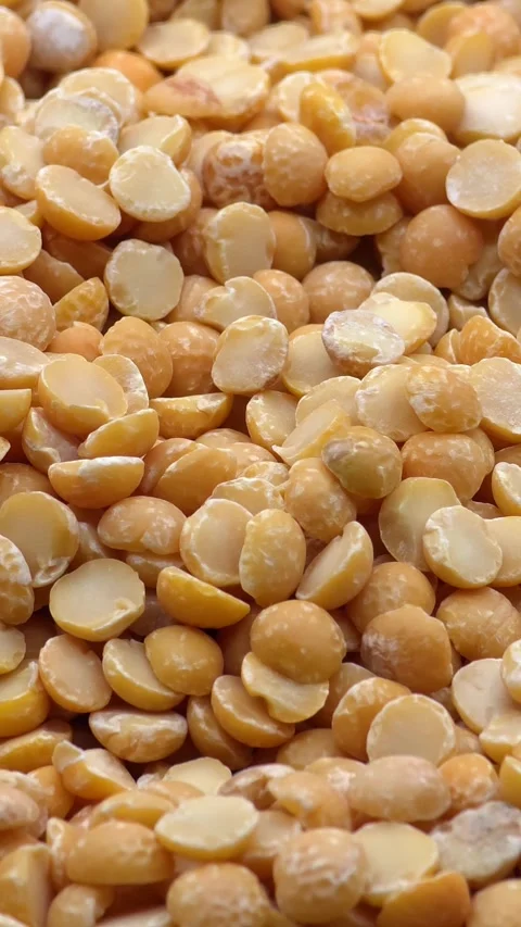 Porous texture of yellow split peas Stock Footage 327869717