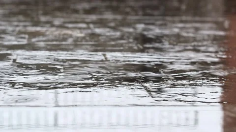 Porphyry floor in the rain with shallow depth of field Stock Footage 82007260