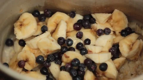 Porridge is being mixed Видео 133936721