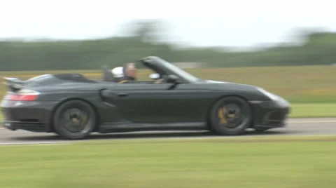 Porsche convertible on track Stock Footage 33369523