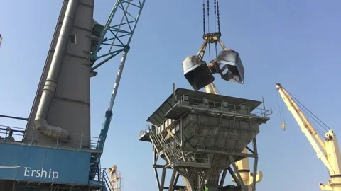 Port activity, unloading grain from a ship Stock Footage 311516401