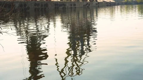 Port barges, a reflection of offshore cranes from the surface of the water. Stock Footage 106997119