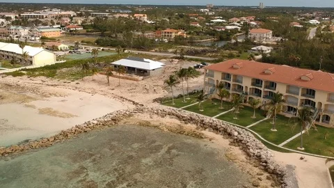 Port of Call Beachfront and Blue Water, Freeport Grand Bahama Aerial Stock Footage 88992208