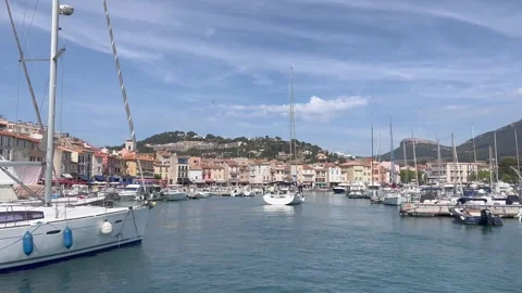 Port of Cassis full of yachts. View from a moving boat. French Riviera, France Stock Footage 241656972