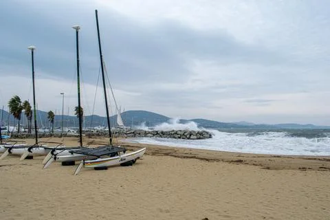 Port Cogolin boats on the seaside shore rainy day Stock Photos