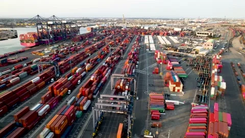 Port Container Terminal with Cranes and Long Cargo Rows, 4K Stock Footage 160313396