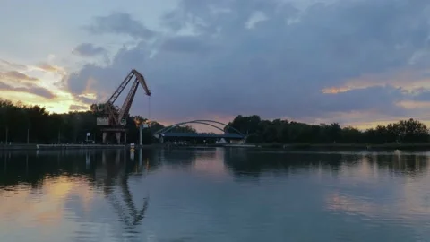 Port crane bridge and bulk carrier at sunset. Stock Footage 146043422