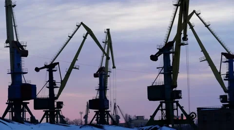 Port cranes at sunset Stock Footage 61129428