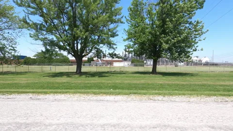Port Dover, Can May 23 2026 POV side view driving plate farms and trees country Stock Footage 338301094