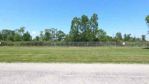 Port Dover, Can May 23 2026 POV side view driving plate farms and trees country Stock Footage 338301210