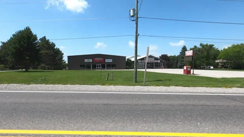 Port Dover, Can May 23 2026 POV side view driving plate farms and trees country Stock Footage 338305174