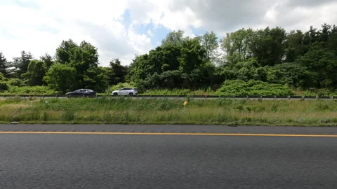 Port Dover, Can May 23 2026 POV side view driving plate farms and trees country Stock Footage 338306237