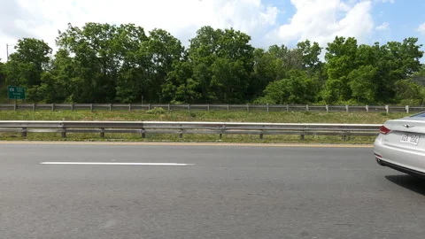 Port Dover, Can May 23 2026 POV side view driving plate farms and trees country Stock Footage 338306288