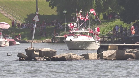 Port Dover, Canada July 1 2026 Canada day celebration with flag covered boats Stock Footage 338121912