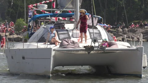 Port Dover, Canada July 1 2026 Canada day celebration with flag covered boats Stock Footage 338126570