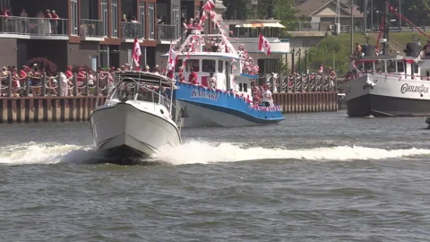 Port Dover, Canada July 1 2026 Canada day celebration with flag covered boats Stock Footage 338126777