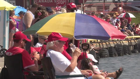 Port Dover, Canada July 1 2026 Canada day celebration with flag covered boats Stock Footage 338127718