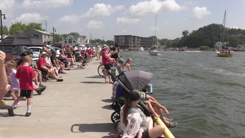 Port Dover, Canada July 1 2026 Canada day celebration with flag covered boats Stock Footage 338129244