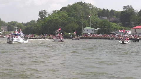 Port Dover, Canada July 1 2026 Canada day celebration with flag covered boats Stock Footage 338130451