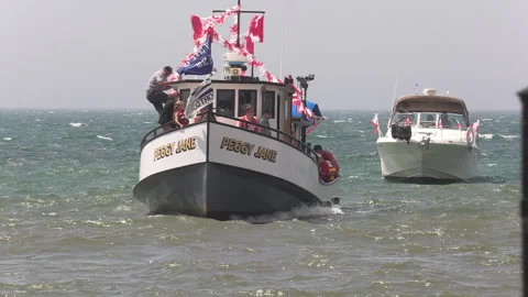Port Dover, Canada July 1 2026 Canada day celebration with flag covered boats Stock Footage 338132923