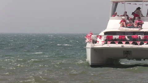 Port Dover, Canada July 1 2026 Canada day celebration with flag covered boats Stock Footage 338133345