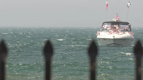 Port Dover, Canada July 1 2026 Canada day celebration with flag covered boats Stock Footage 338133353