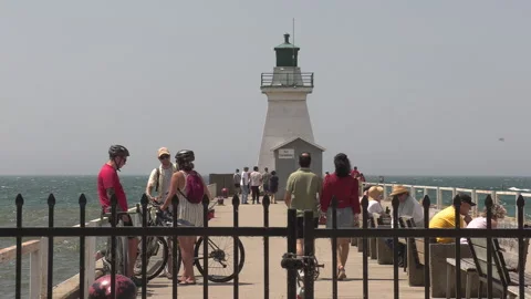 Port Dover, Canada July 1 2026 Canada day celebration with flag covered boats Stock Footage 338133830