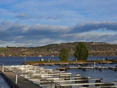 Port empty of boats at the arrival of autumn in Norway Stock Photos