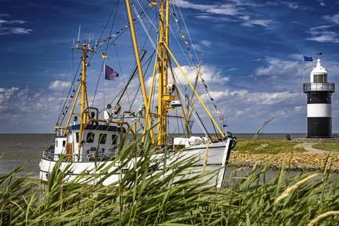 Port entry of a cutter from the Outer Weser, Germany Stock Photos