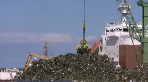 Port facility crane operations on scraps Stock-Footage 53968866
