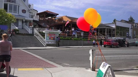 Port Friday, balloons floating on string Stock Footage 50110288