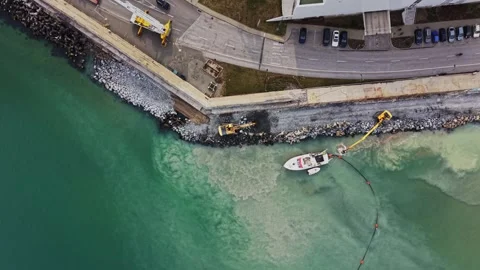 Port infrastructure and dredging works from above Stock Footage 338187060