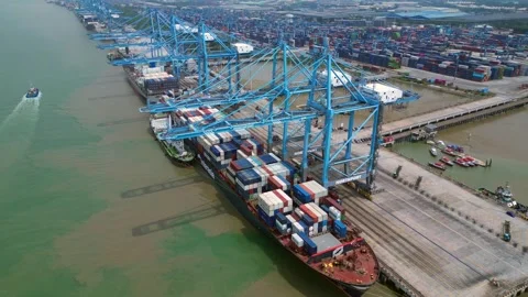Port Klang with container ships loading cargo. Amazing aerial view drone Stock Footage 344607566