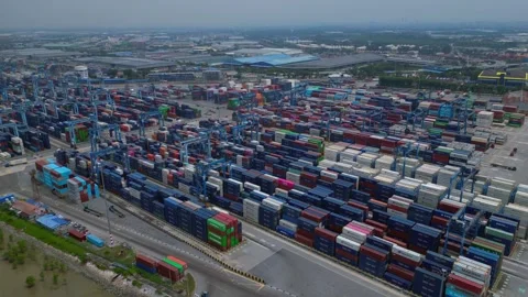 Port Klang with container ships loading cargo. Lovely aerial view drone Stock Footage 344608185