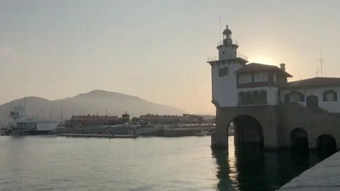 Port Lighthouse on calm evening Stock Footage 137646074