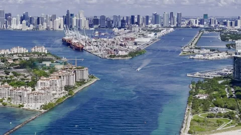 Port Miami container terminal and Downtown Miami skyline, aerial sightseeing, Stock Footage 346620906