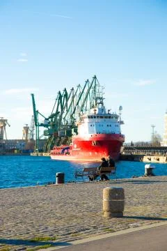 Port with a red ship Foto stock