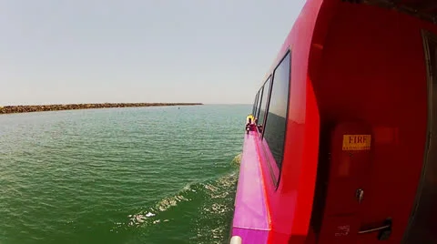 Port Side Of Long Beach Aqualink Boat Leaving Alamitos Bay Stock Footage