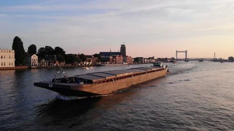 Port Side View Of Typhoon Pusher Tug Boat Navigating Oude Maas. Aerial Stock Footage 162554697