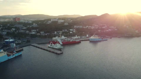 The port of St. John's as the sun rises over Signal Hill Stock Footage 214430159