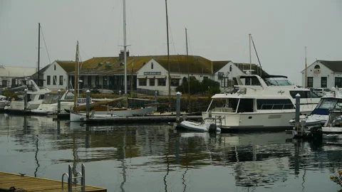Port Townsend, Washington, a cloudy day, marina foreground, building in back Stock Footage 287315016