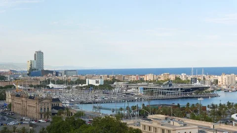 Port Vell harbour and Rambla del Mar, Barcelona cityscape and sea from top Stock Footage 102916232