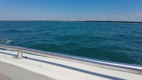 Port View Of Water Waves Wake Splashing On Gunwhale Of Boat In Ocean Water Stock-Footage 249945787