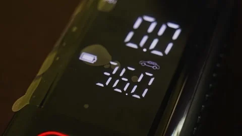 Portable air inflator with multiple function key button tilt down short 4k Stock-Footage 289400481