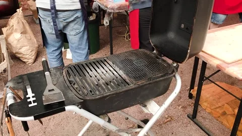 Portable backyard grill, cleaning of soot, maintenance 스톡 동영상 249741465
