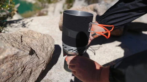 Portable Camping Stove in Action The Essential Tool for Outdoor Cooking Stock Footage 318860674