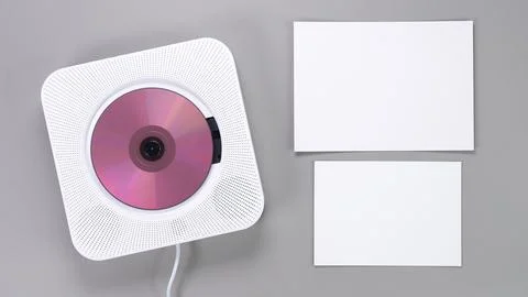Portable CD Player on Gray Background with Blank Cards for Text, Music and Sound Stock Photos