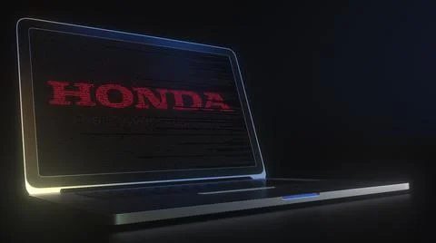 Portable computer with the logo of HONDA made with code strings, editorial Illustrazione stock