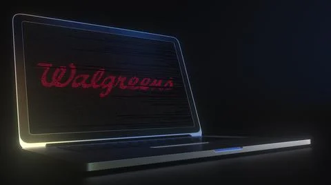 Portable computer with the logo of WALGREENS made with code strings, editorial Stock Illustration